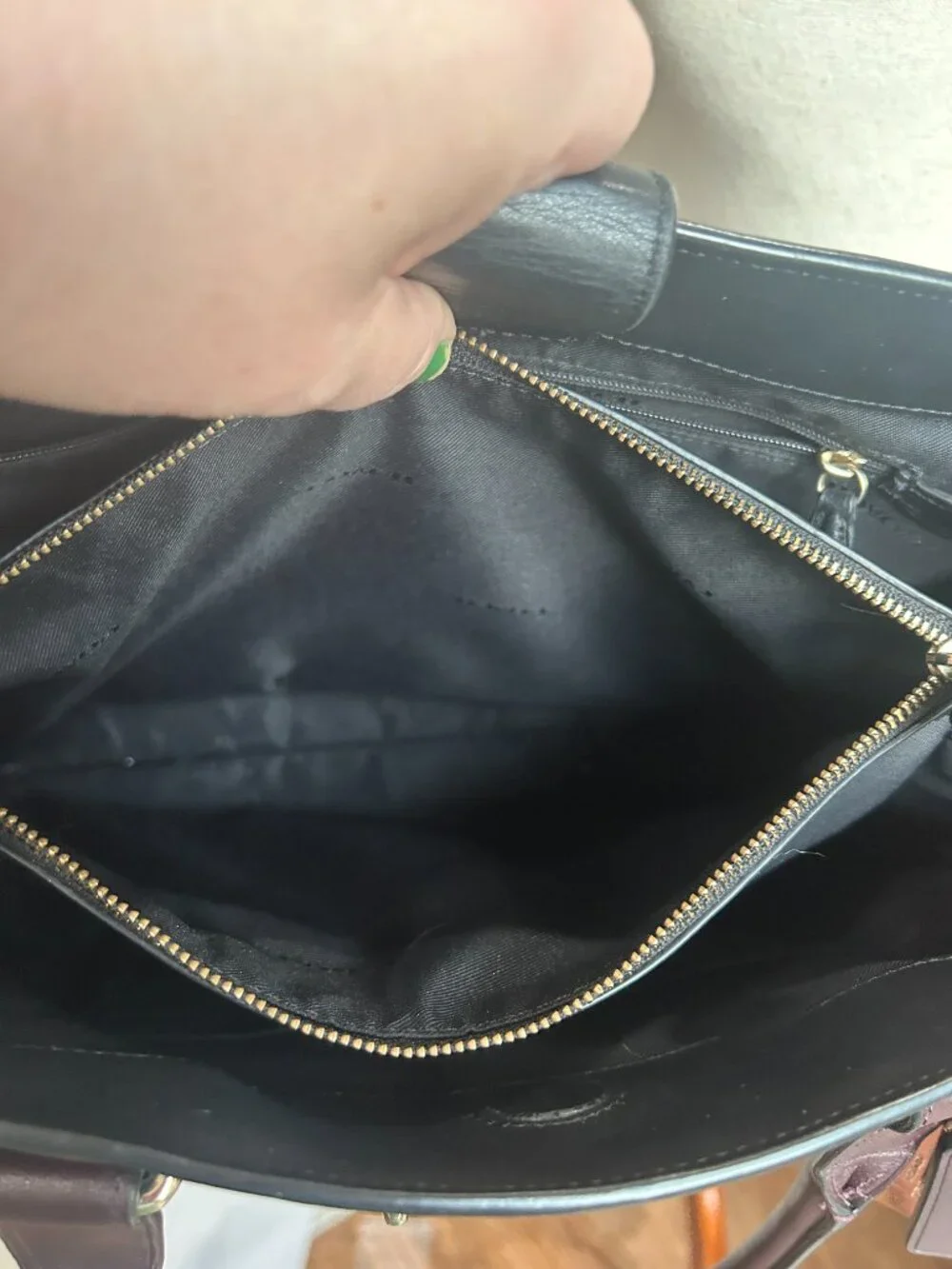 Coach Swagger Carryall in black leather with snakeskin-embossed side panel